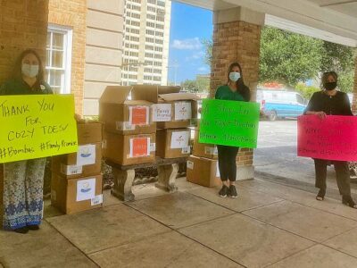 Tamilla Drew of Catholic Charities, Jennifer Smith of Giving Closet and Monique Elton of Changing Homelessness at the sock giveaway sponsored by Family Promise